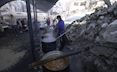 Our partners, WFP staff, cooking hot meals to distribute in Gaza