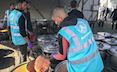 Our partners, WFP staff, cooking hot meals to distribute in Gaza