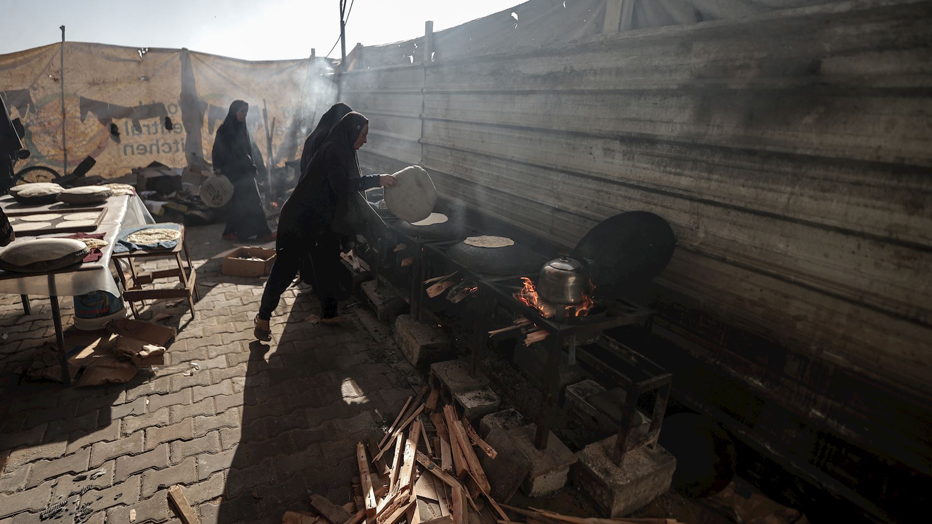 Our partners in Gaza, WFP staff, preparing fresh bread to distribute in Gaza.